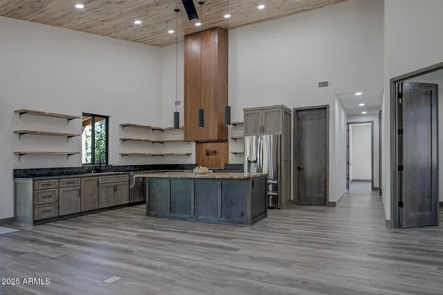 a bedroom with a bed and dresser