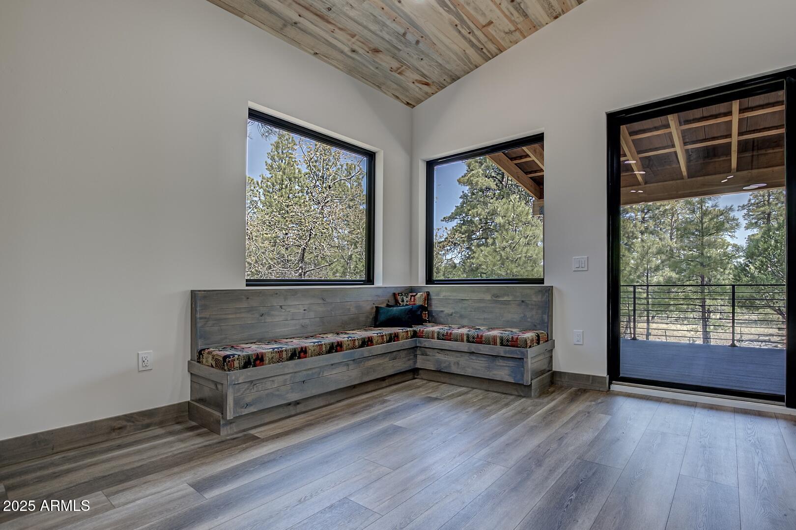 2965 Eagle Ridge Circle Happy Jack, AZ 86024 - Photo 26 of 54 a living room with furniture and a large window