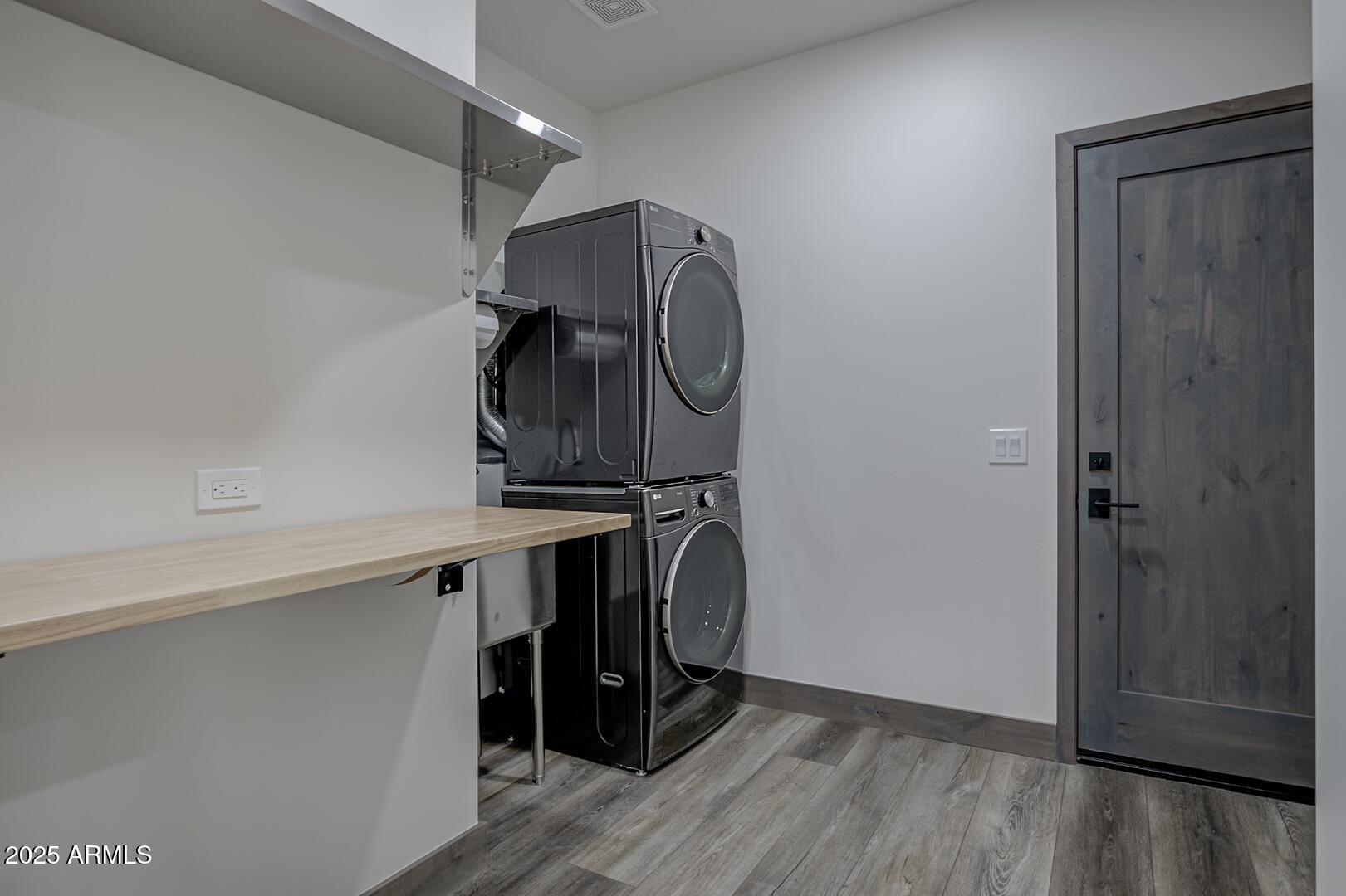 2965 Eagle Ridge Circle Happy Jack, AZ 86024 - Photo 27 of 54 a view of walk in closet with wooden floor