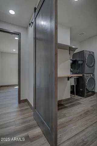 a spacious bathroom with a double vanity sink and mirror