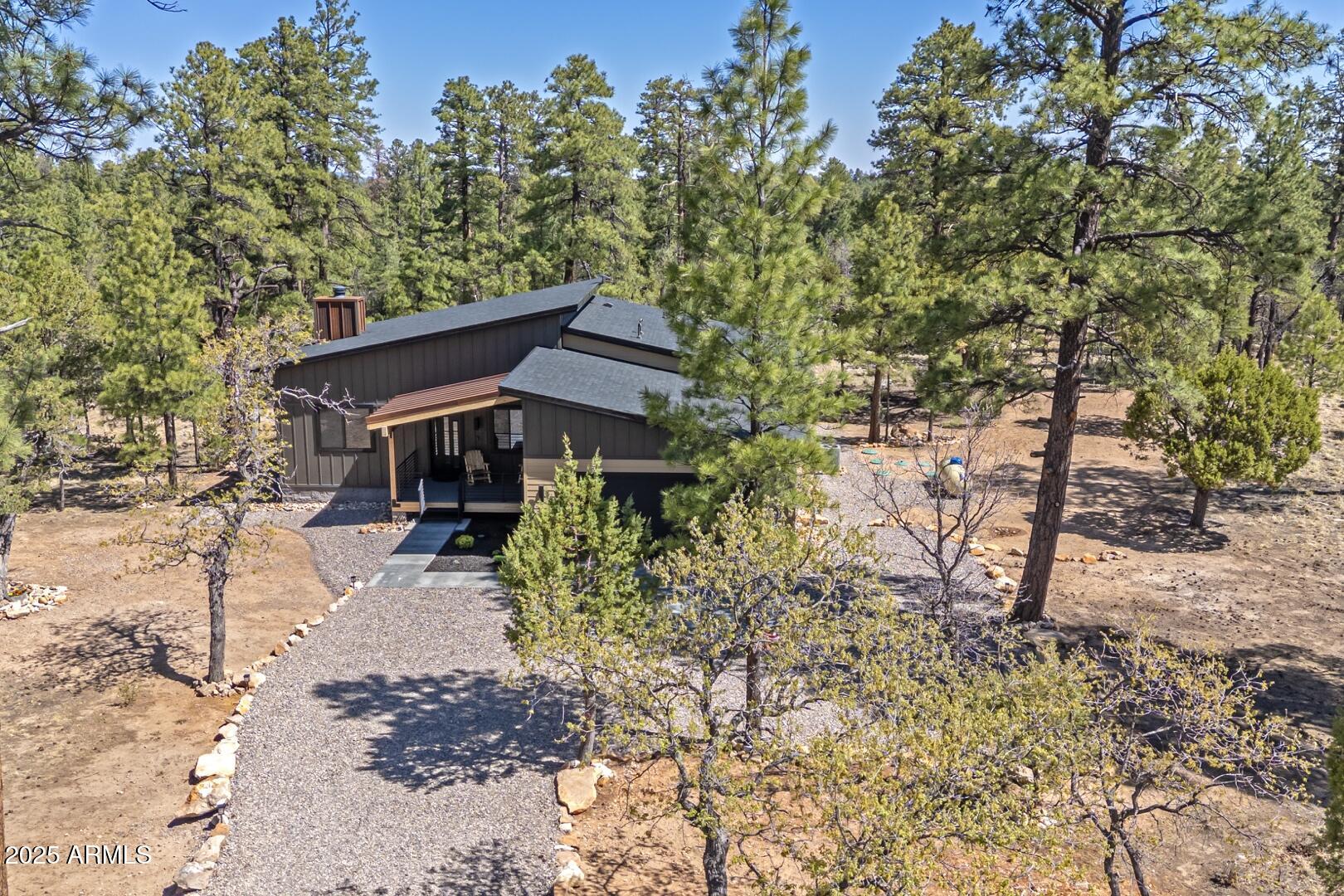 2965 Eagle Ridge Circle Happy Jack, AZ 86024 - Photo 54 of 54 a house view with a outdoor space