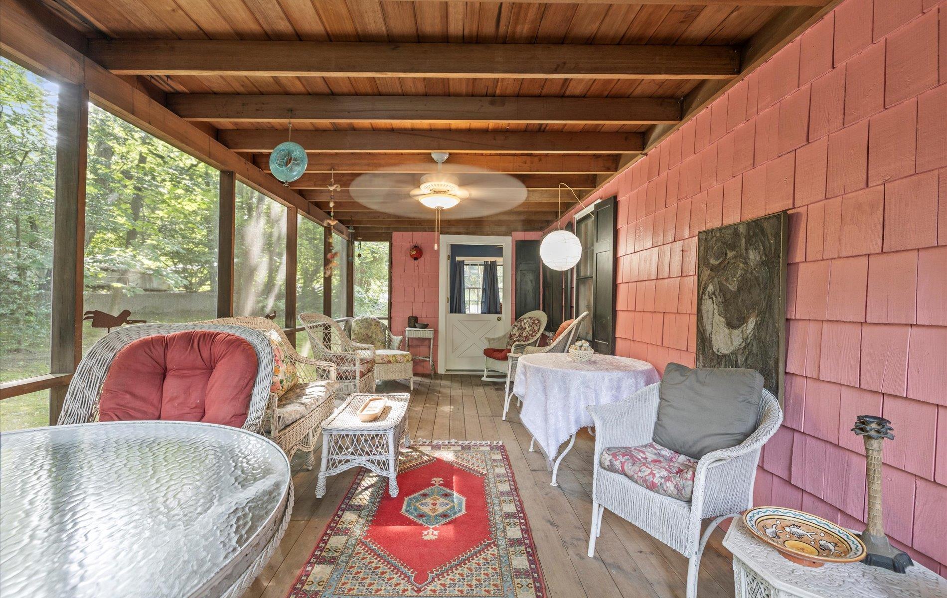 101 Forest Road Queens, NY 11363 - Photo 15 of 50 a living room with furniture and a large window