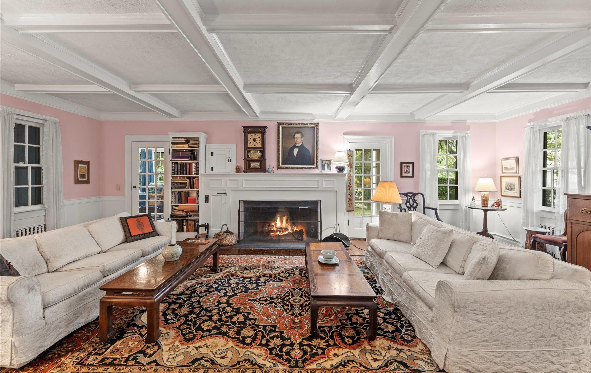 101 Forest Road Queens, NY 11363 - Photo 2 of 50 a living room with furniture and a fireplace