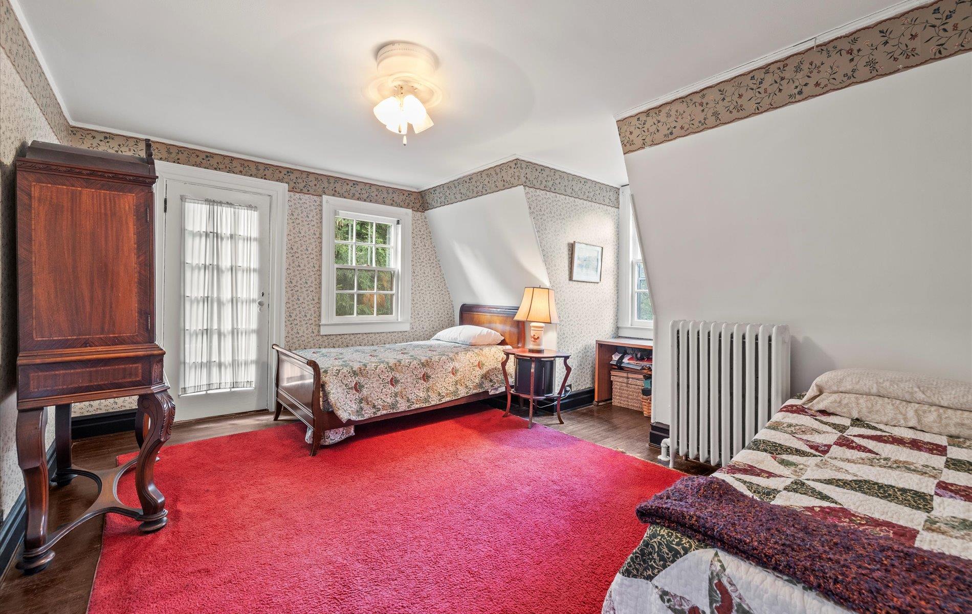 101 Forest Road Queens, NY 11363 - Photo 24 of 50 a bedroom with a bed and a window