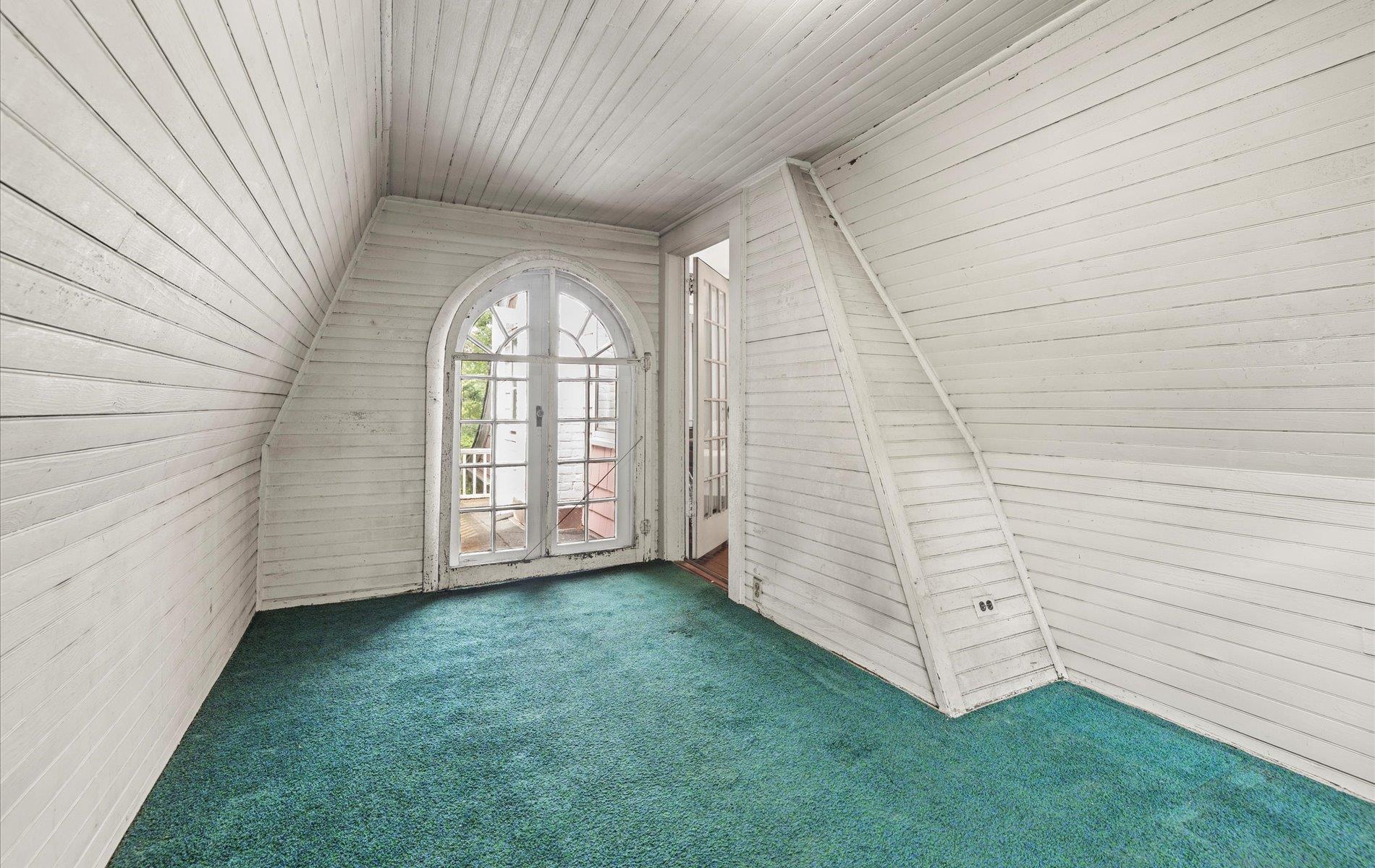 101 Forest Road Queens, NY 11363 - Photo 25 of 50 wooden floor in an empty room with a window