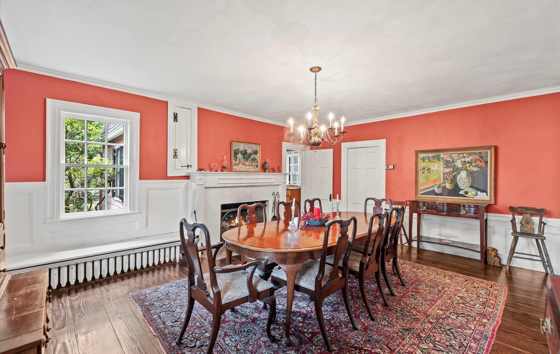 101 Forest Road Queens, NY 11363 - Photo 6 of 50 a view of a dining room with furniture a chandelier and wooden floor