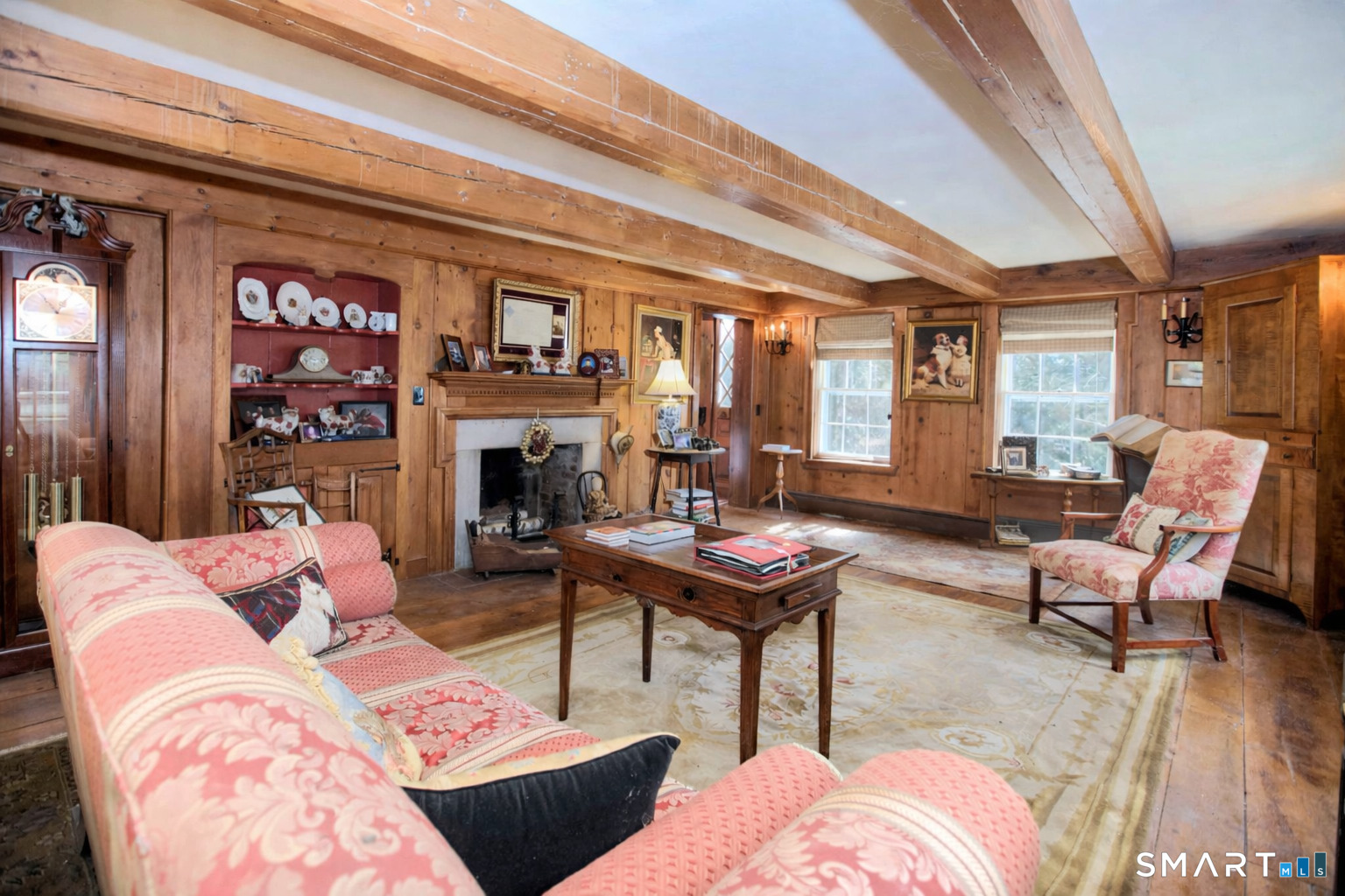 320 North Salem Road Ridgefield, CT 06877 - Photo 6 of 25 a living room with furniture fireplace and a window