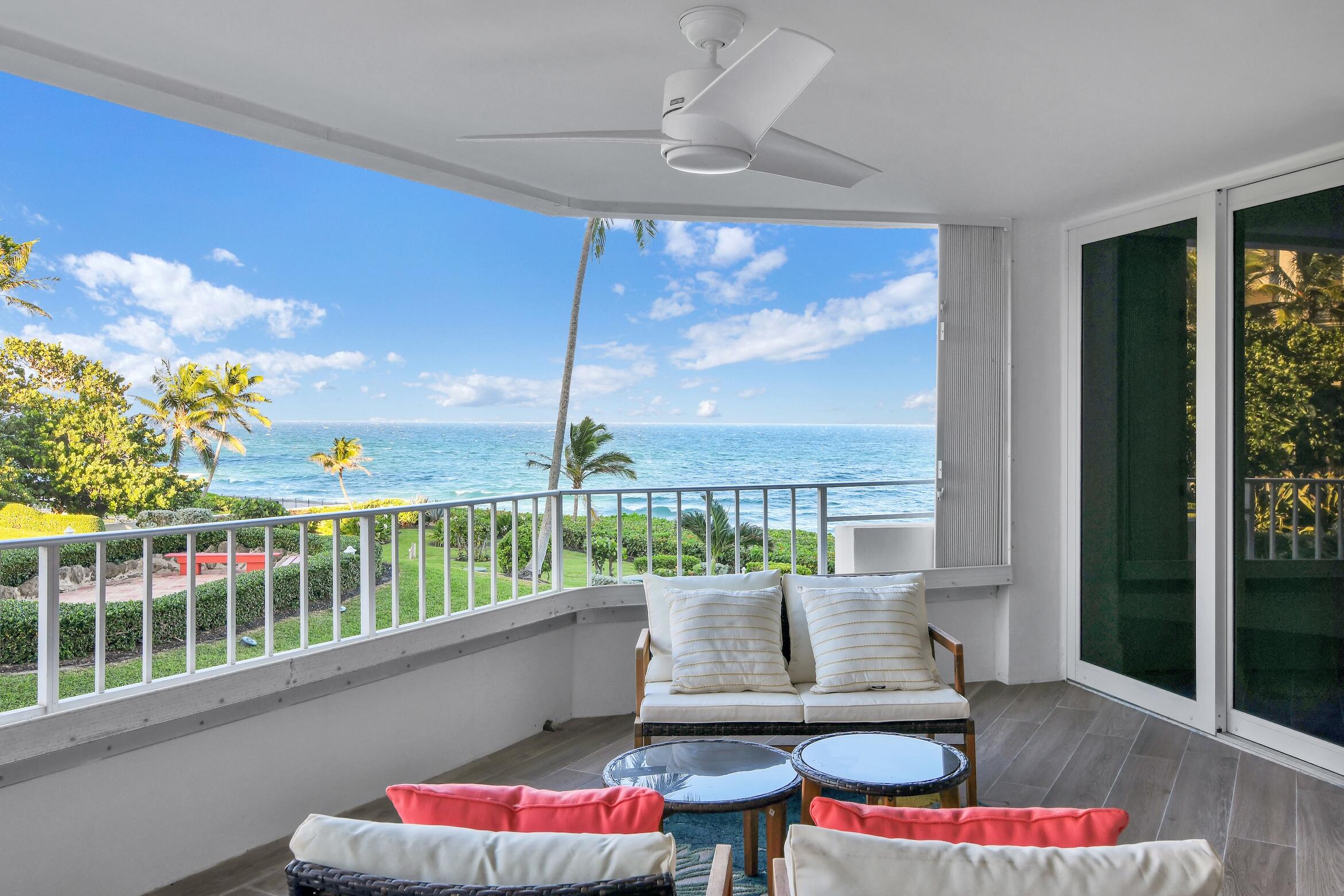 500 South Ocean Boulevard, Unit 303 Boca Raton, FL 33432 - Photo 23 of 46 a living room with furniture and a large window