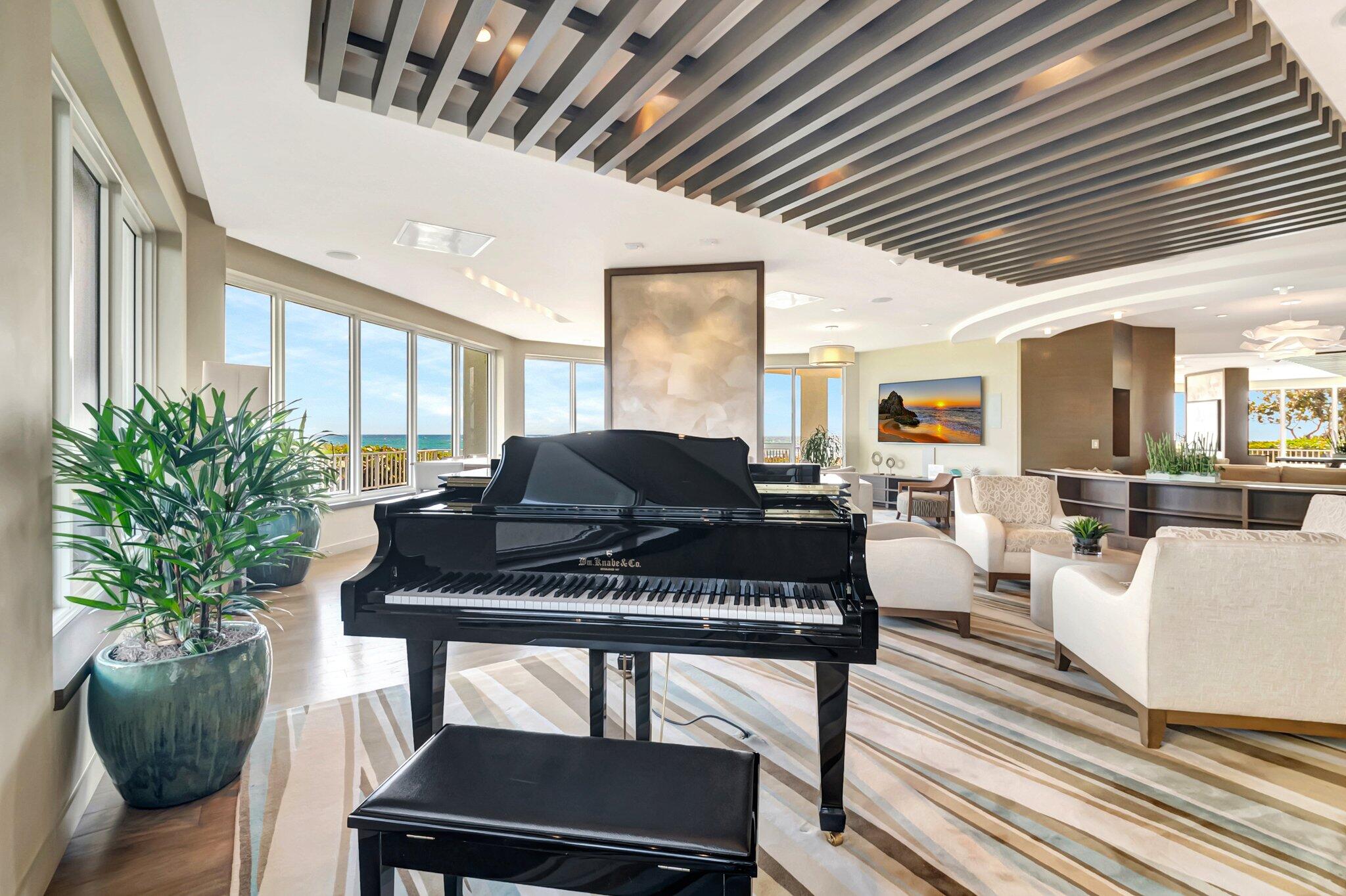 500 South Ocean Boulevard, Unit 303 Boca Raton, FL 33432 - Photo 32 of 46 a living room with furniture a window and a potted plant