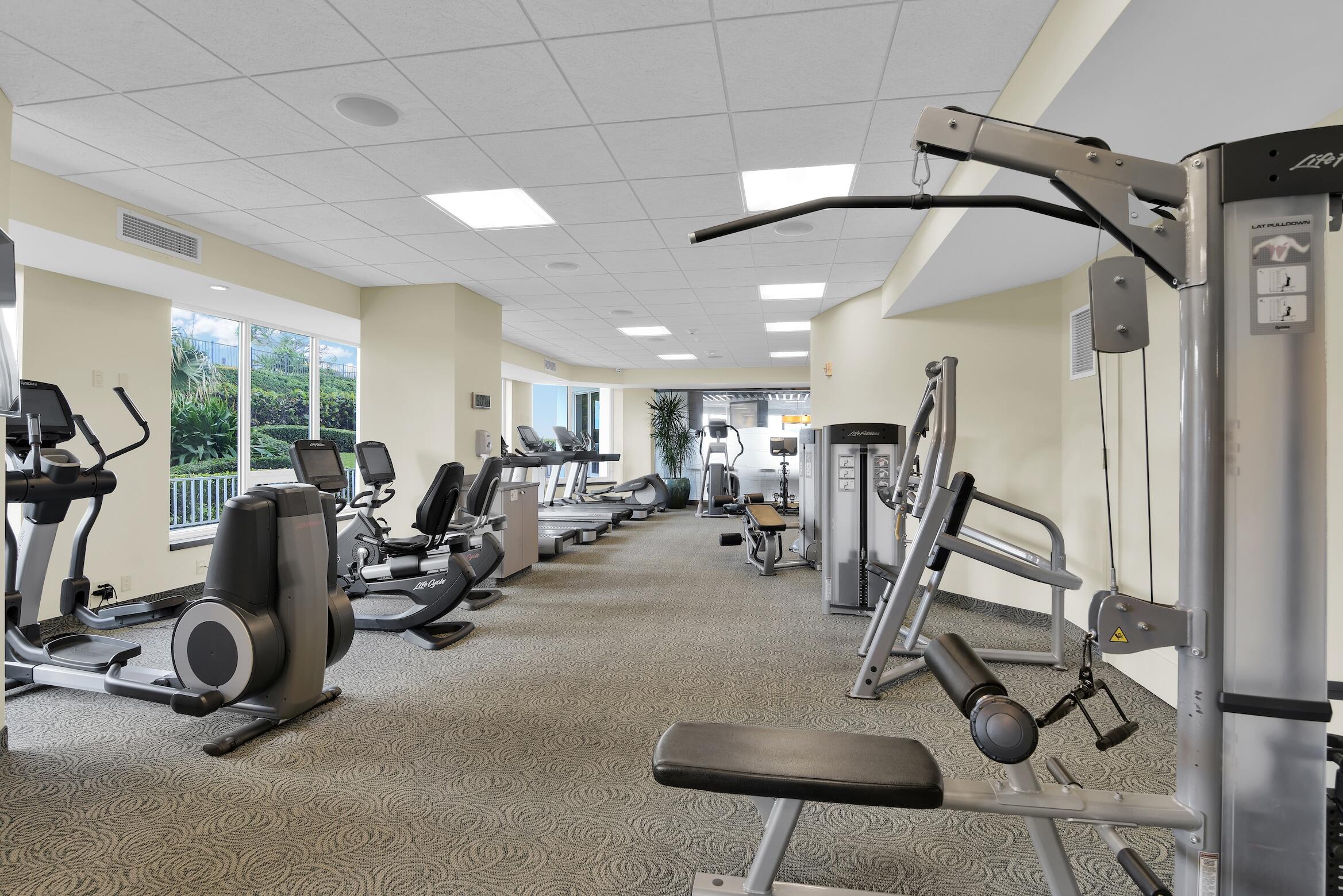500 South Ocean Boulevard, Unit 303 Boca Raton, FL 33432 - Photo 34 of 46 a view of a room with gym equipment