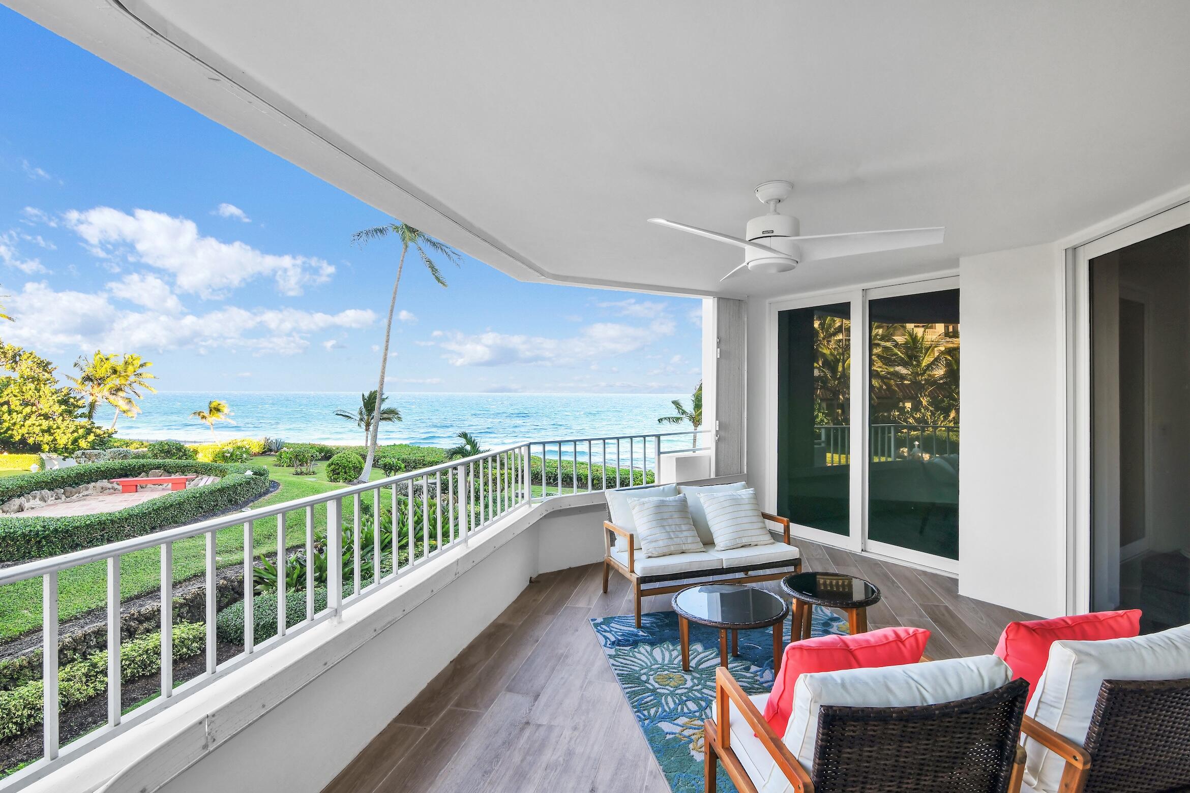 500 South Ocean Boulevard, Unit 303 Boca Raton, FL 33432 - Photo 46 of 46 a balcony with furniture and wooden floor