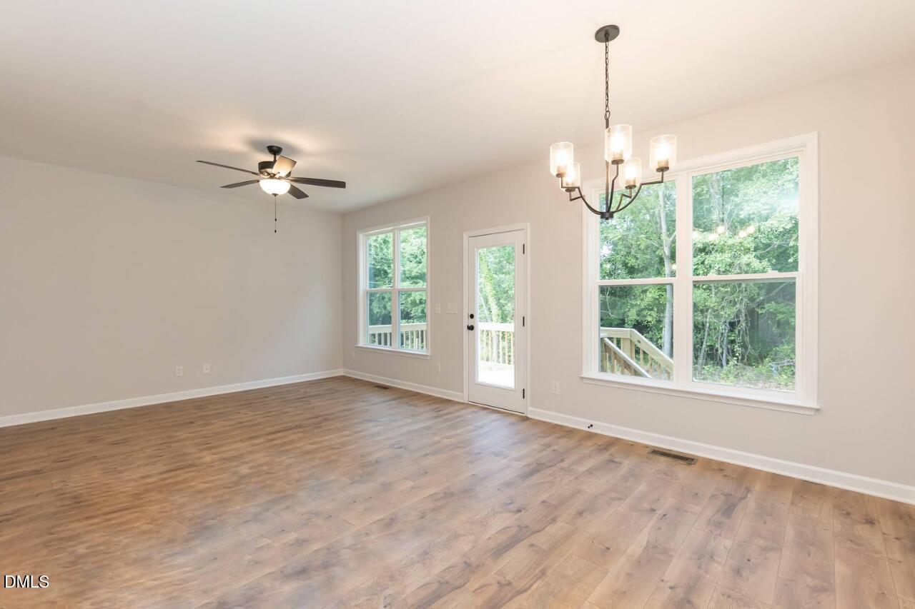1020 Raven Street Durham, NC 27704 - Photo 8 of 13 a view of an empty room with a window
