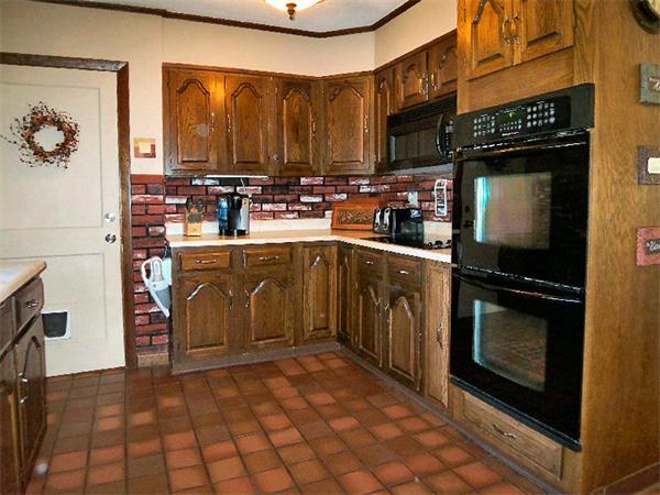 212 Gage Road Athol, MA 01331 - Photo 6 of 9 a kitchen with stainless steel appliances granite countertop a stove a sink and a microwave