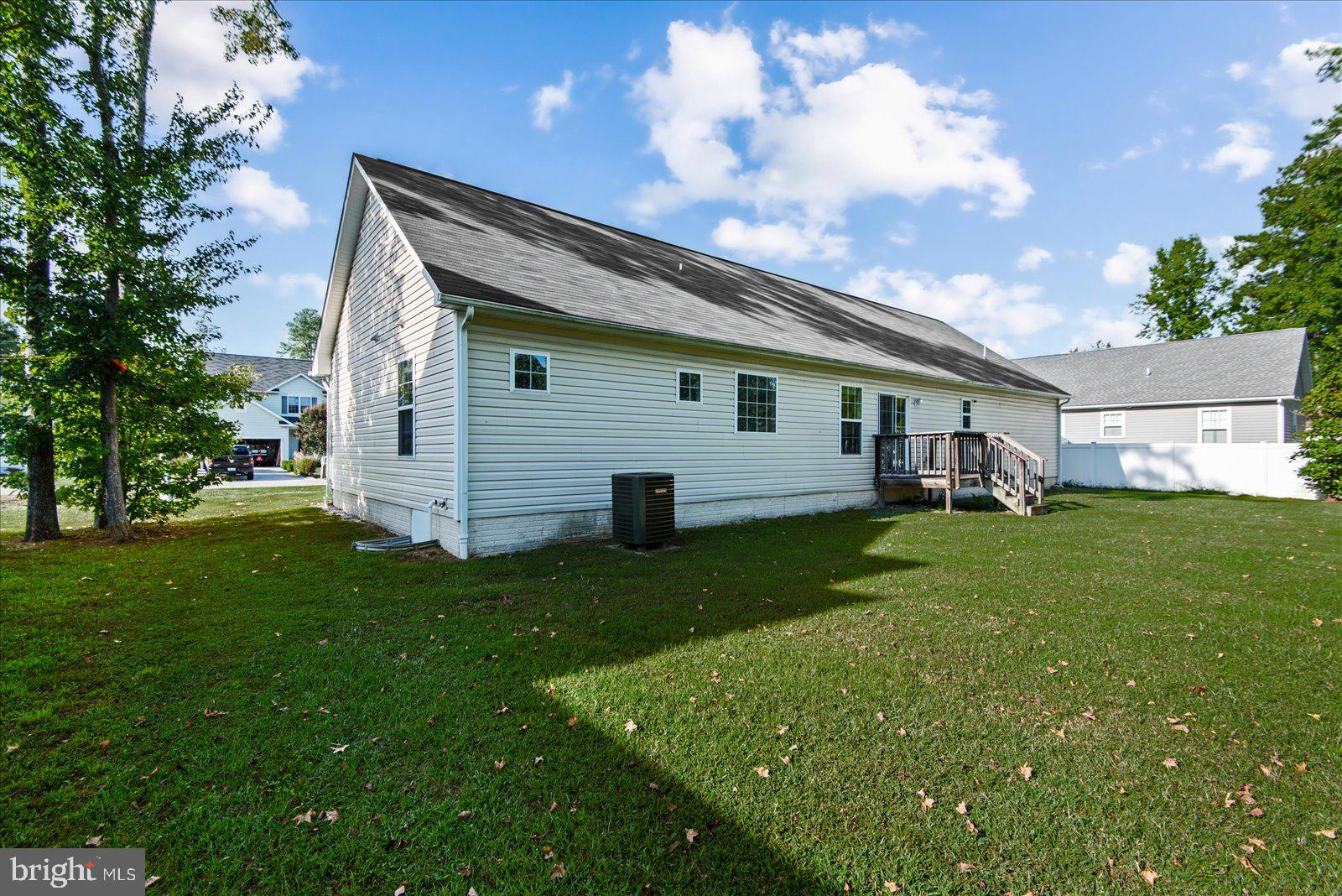 310 3rd Street Colonial Beach, VA 22443 - Photo 35 of 38 a front view of house with yard barbeque and outdoor seating