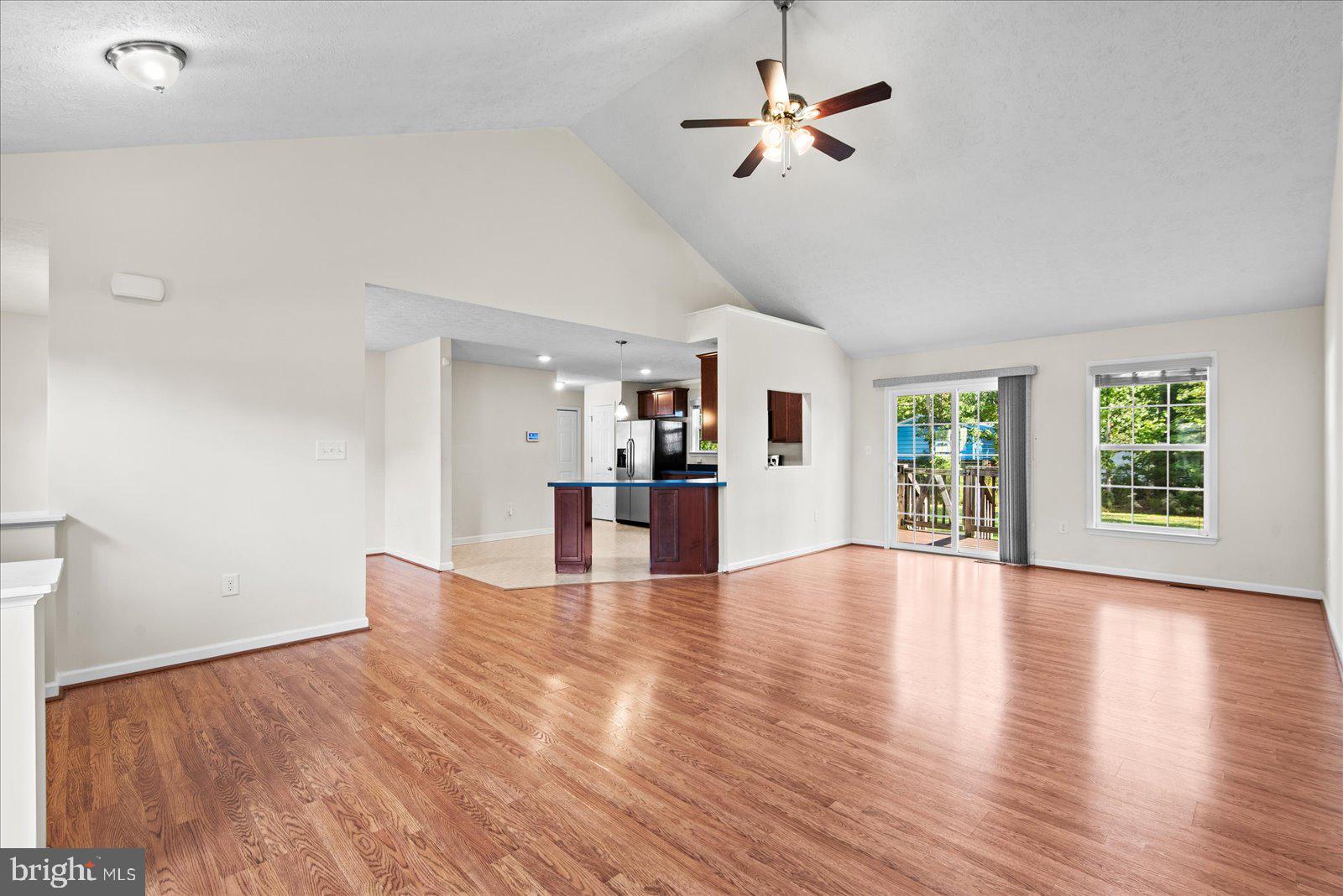 310 3rd Street Colonial Beach, VA 22443 - Photo 8 of 38 a view of empty room with wooden floor and fan