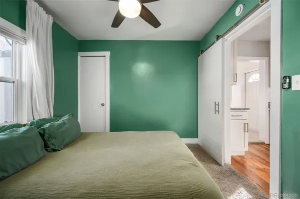 a view of an entryway with table and chair