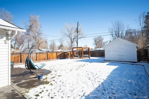 a view of a backyard of the house