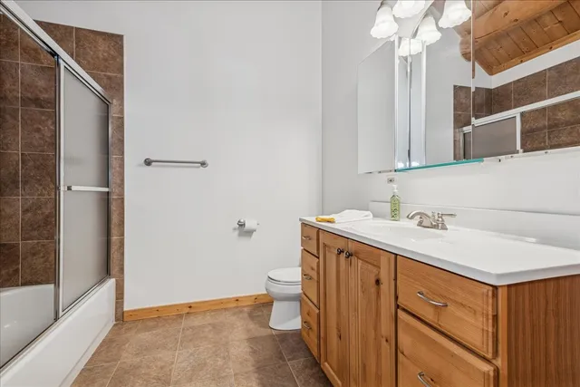 a room with lots of chairs and mirrors