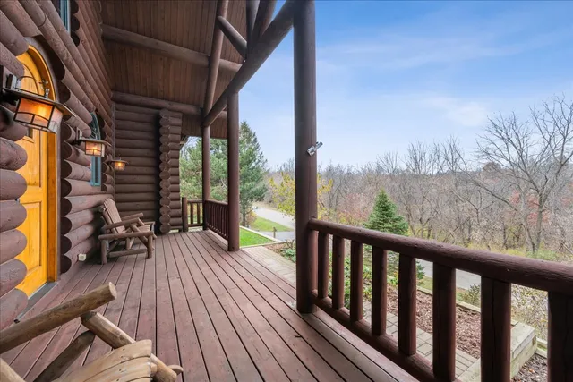 a view of balcony with couch and wooden floor