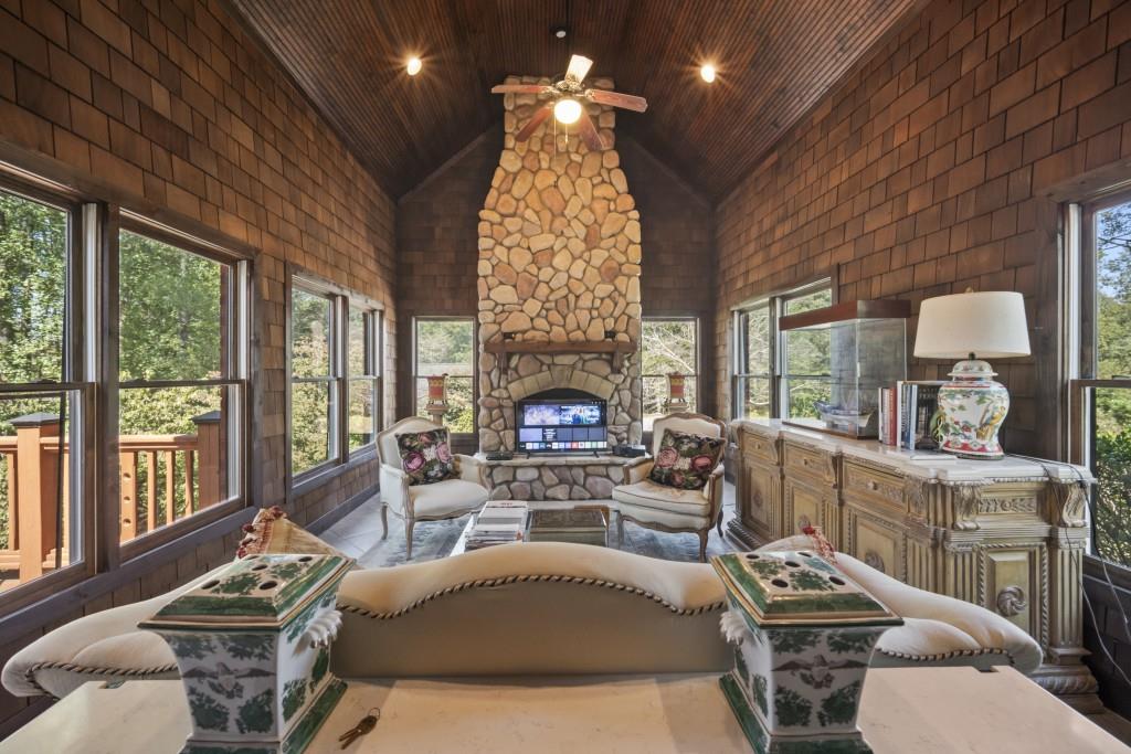 988 Grantham Way Southwest Marietta, GA 30064 - Photo 22 of 51 a living room with furniture fireplace and large windows
