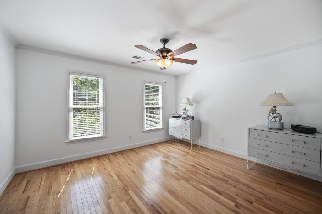 988 Grantham Way Southwest Marietta, GA 30064 - Photo 31 of 51 a view of an empty room with a window and wooden floor