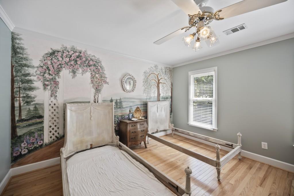 988 Grantham Way Southwest Marietta, GA 30064 - Photo 36 of 51 a bedroom with a bed and a window