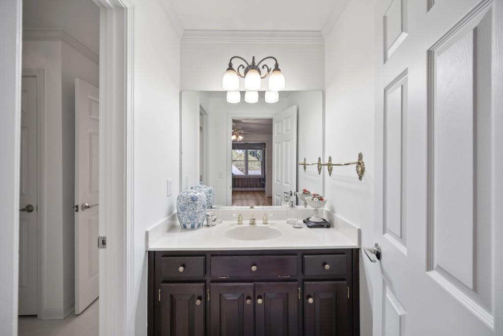 988 Grantham Way Southwest Marietta, GA 30064 - Photo 39 of 51 a bathroom with a sink and a mirror