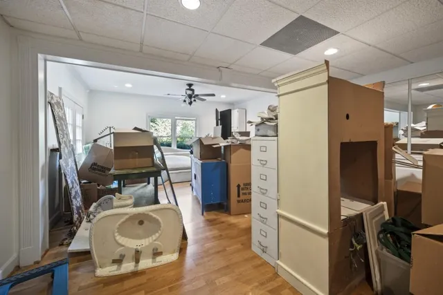 an aerial view of a house with yard swimming pool and outdoor seating