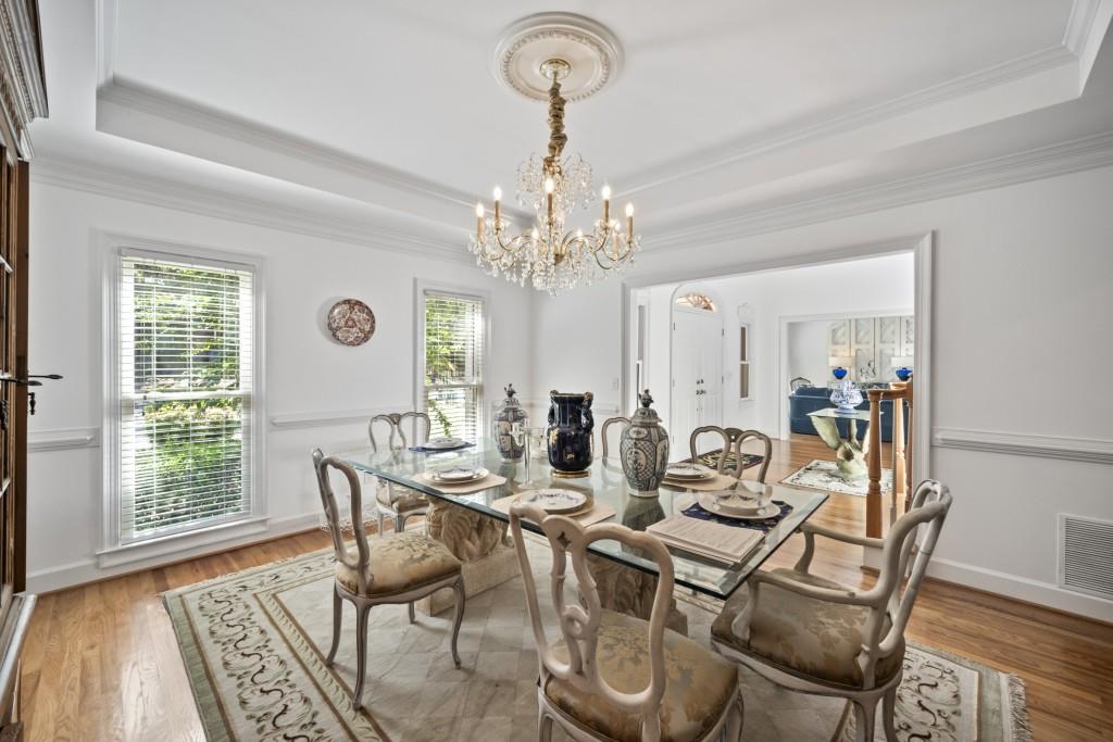 988 Grantham Way Southwest Marietta, GA 30064 - Photo 7 of 51 a view of a dining room with furniture and chandelier
