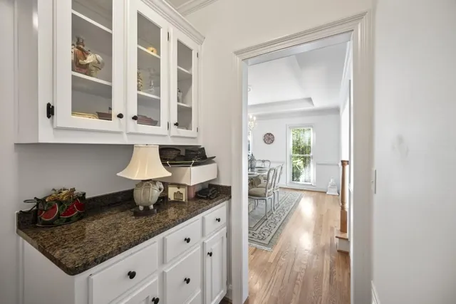 a kitchen with stainless steel appliances granite countertop a sink and cabinets