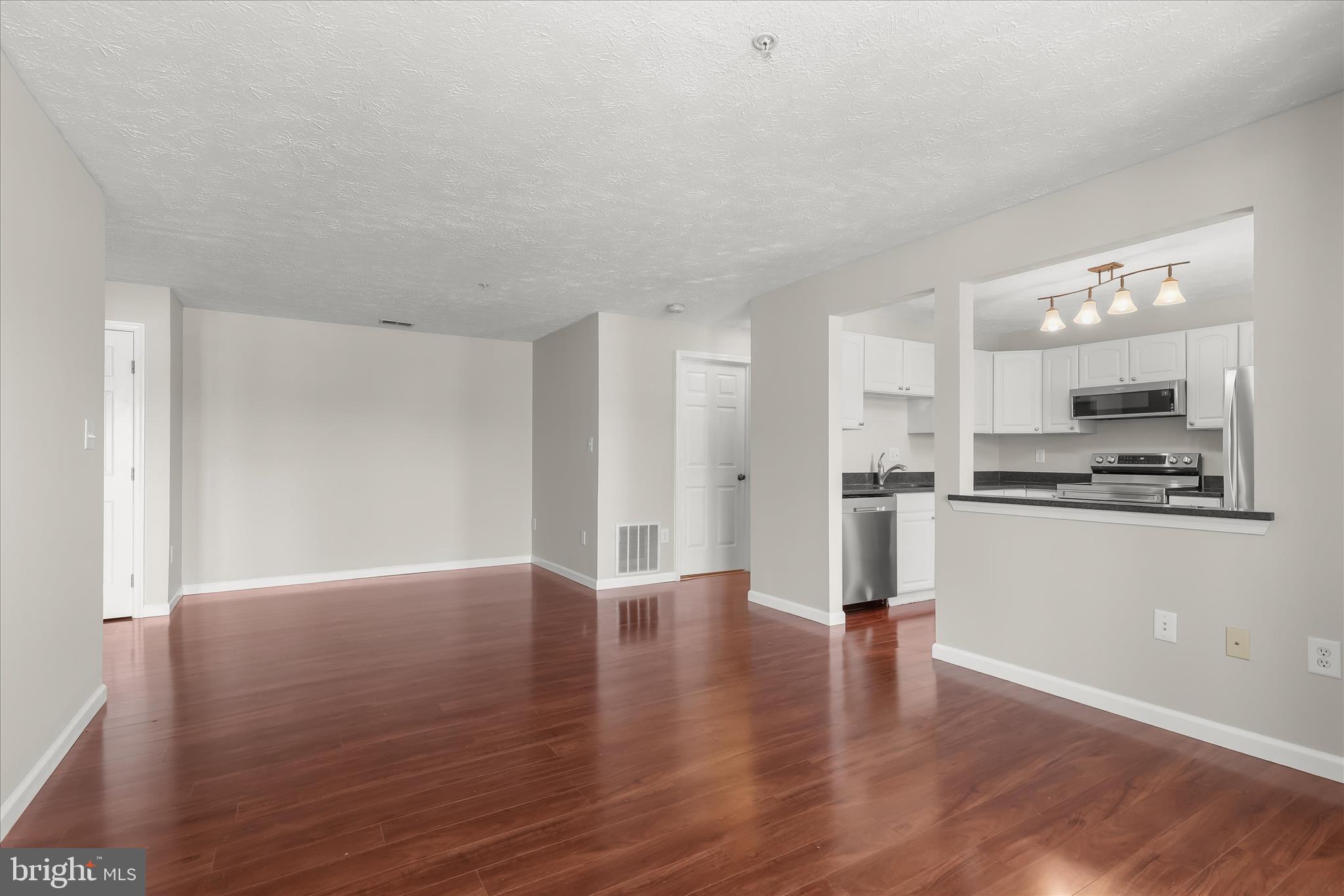 687 Winding Stream Way, Unit 204 Odenton, MD 21113 - Photo 11 of 36 Living & dining areas
