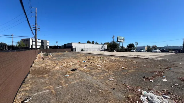 a view of a street with cars