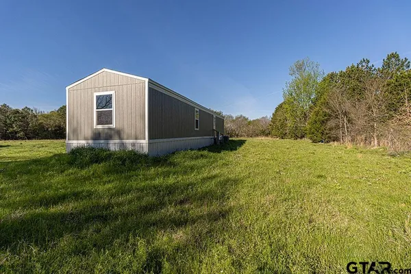 a view of a outdoor space and a yard