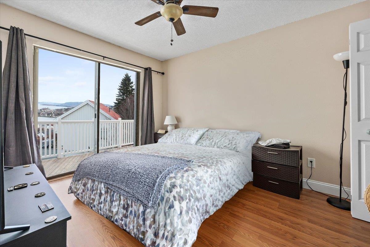 124 Rio Del Mar Street, Unit C St. Augustine, FL 32080 - Photo 13 of 27 a bedroom with a bed and a window