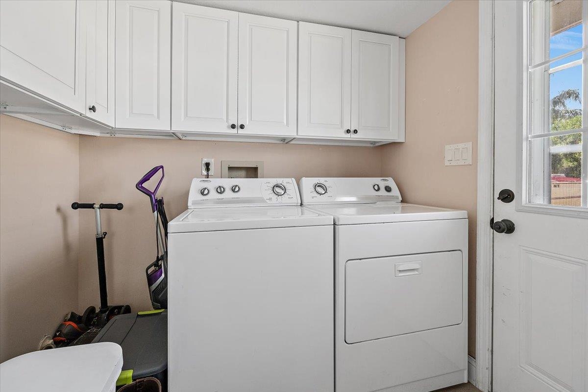 124 Rio Del Mar Street, Unit C St. Augustine, FL 32080 - Photo 8 of 27 a utility room with dryer and washer