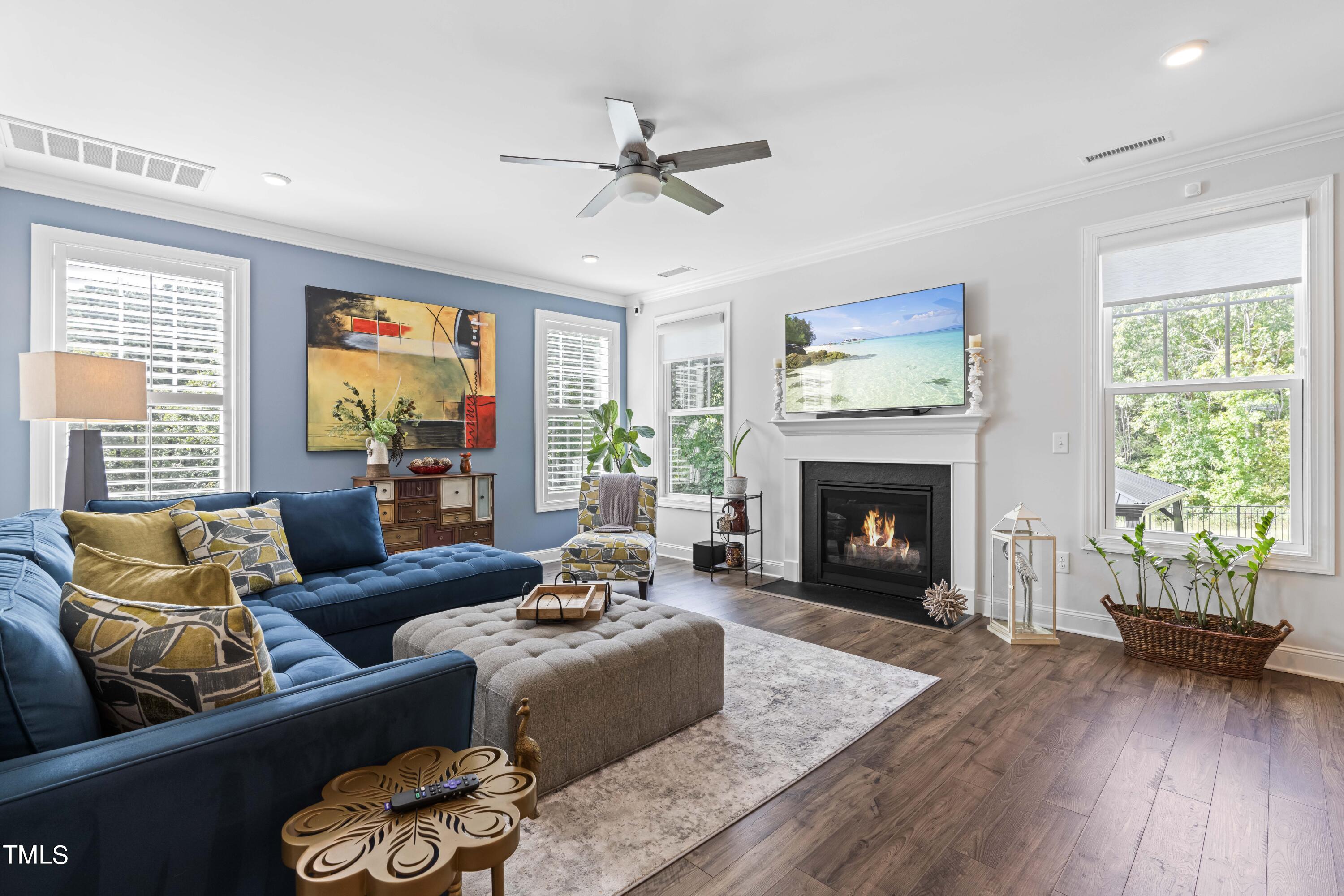 190 Hidden Bluff Drive Pittsboro, NC 27312 - Photo 12 of 58 a living room with furniture and a fireplace