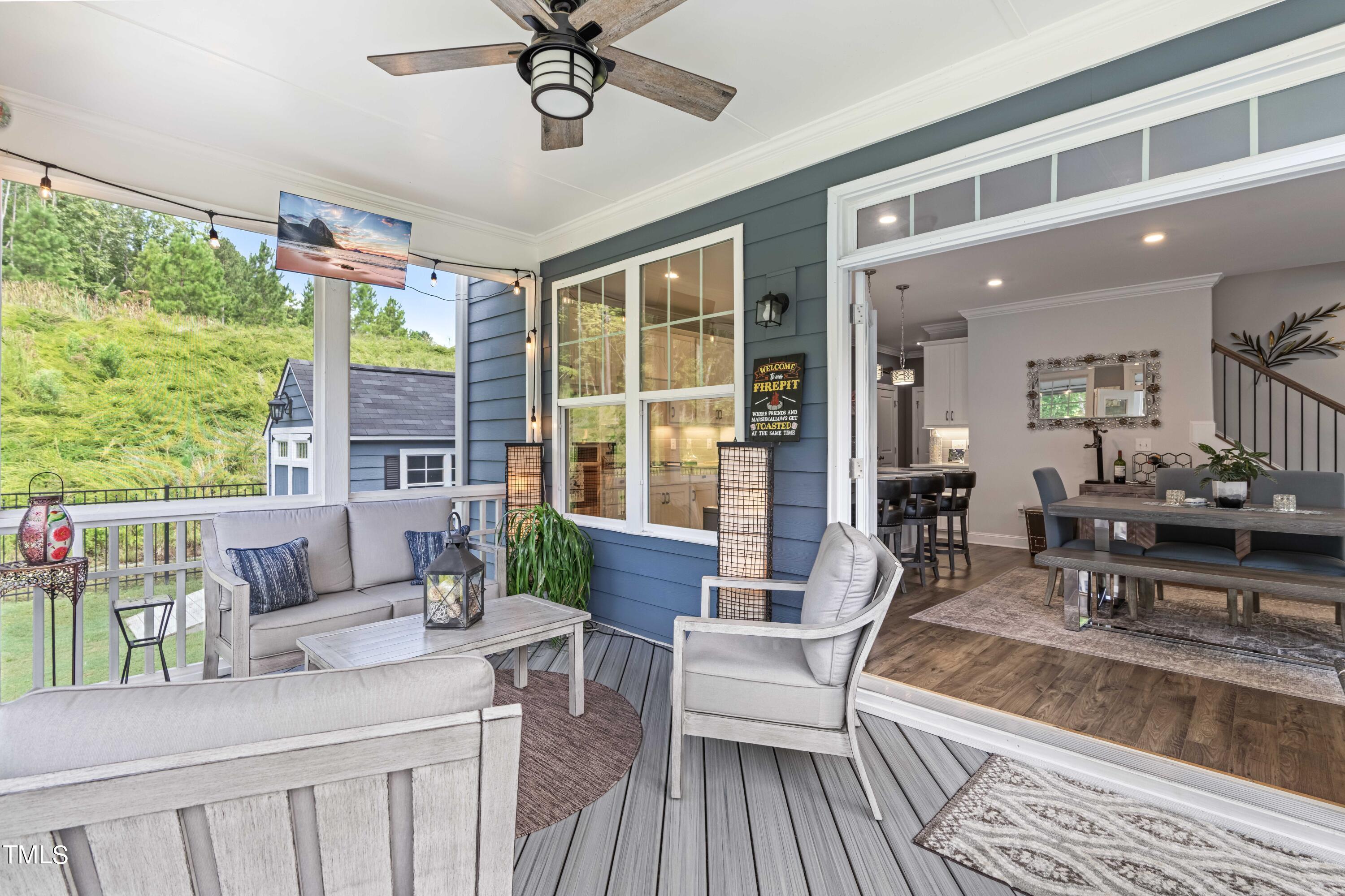 190 Hidden Bluff Drive Pittsboro, NC 27312 - Photo 48 of 58 a living room with furniture and a large window