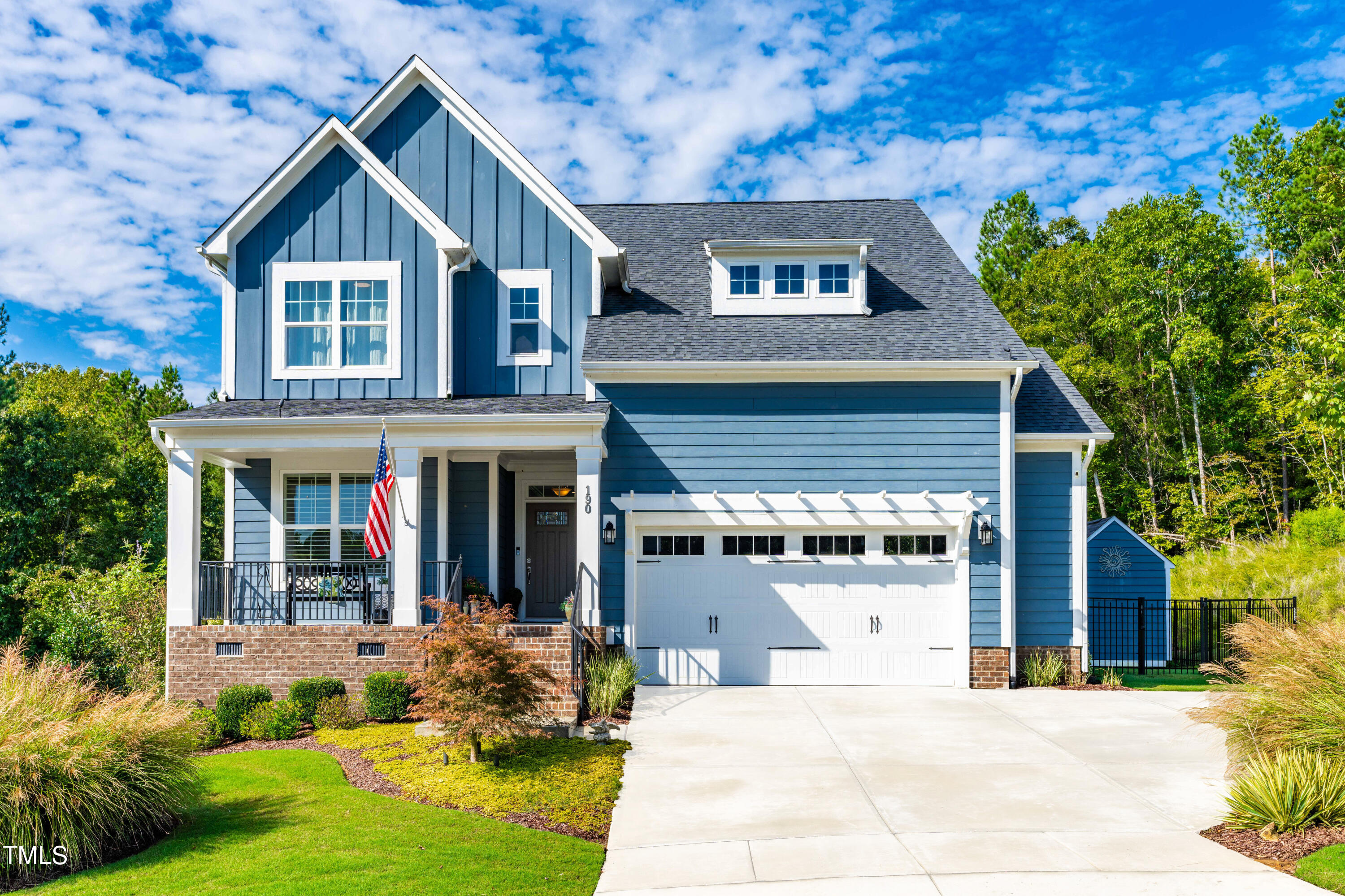 190 Hidden Bluff Drive Pittsboro, NC 27312 - Photo 5 of 58 a front view of a house with a yard