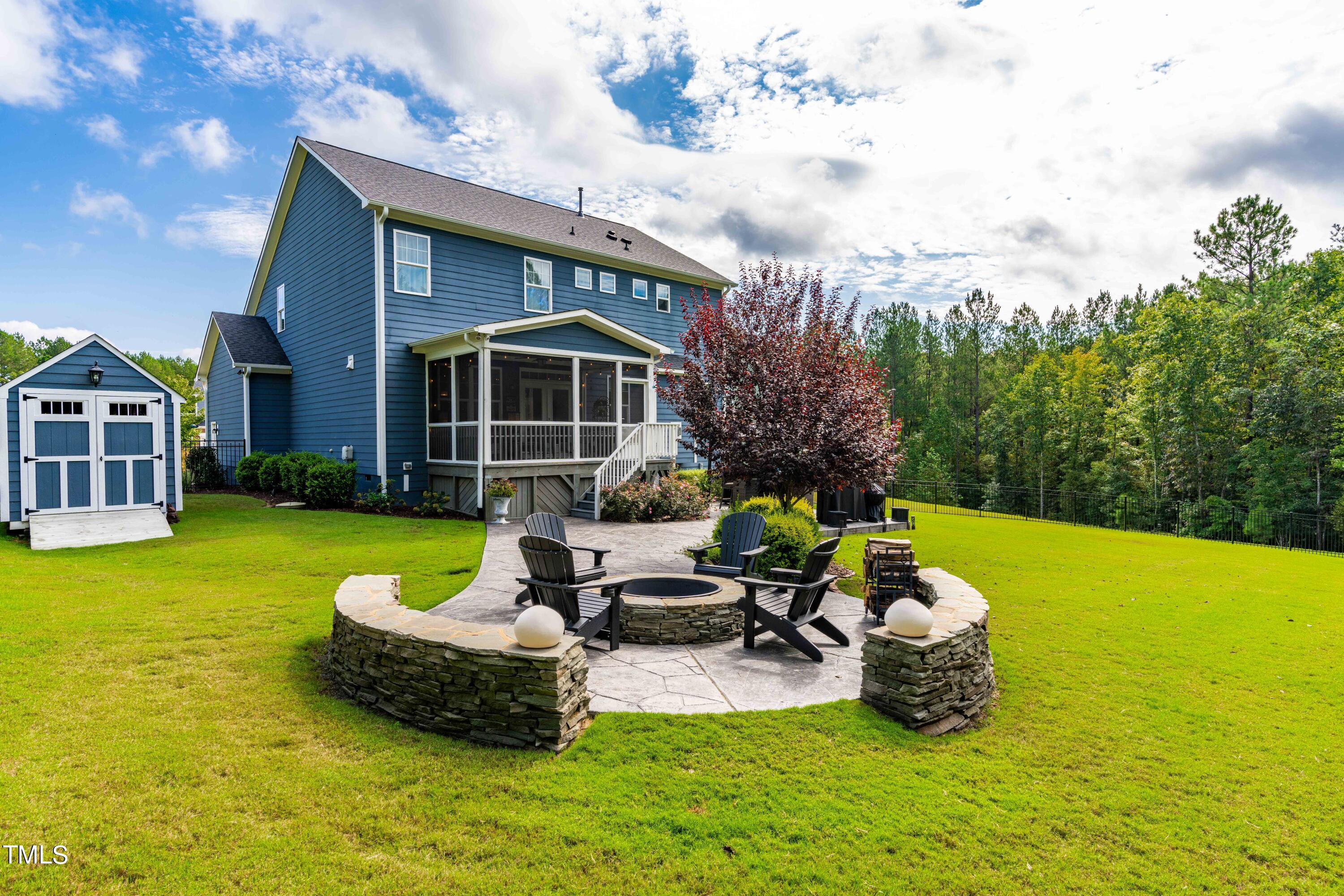 190 Hidden Bluff Drive Pittsboro, NC 27312 - Photo 52 of 58 a front view of a house with garden