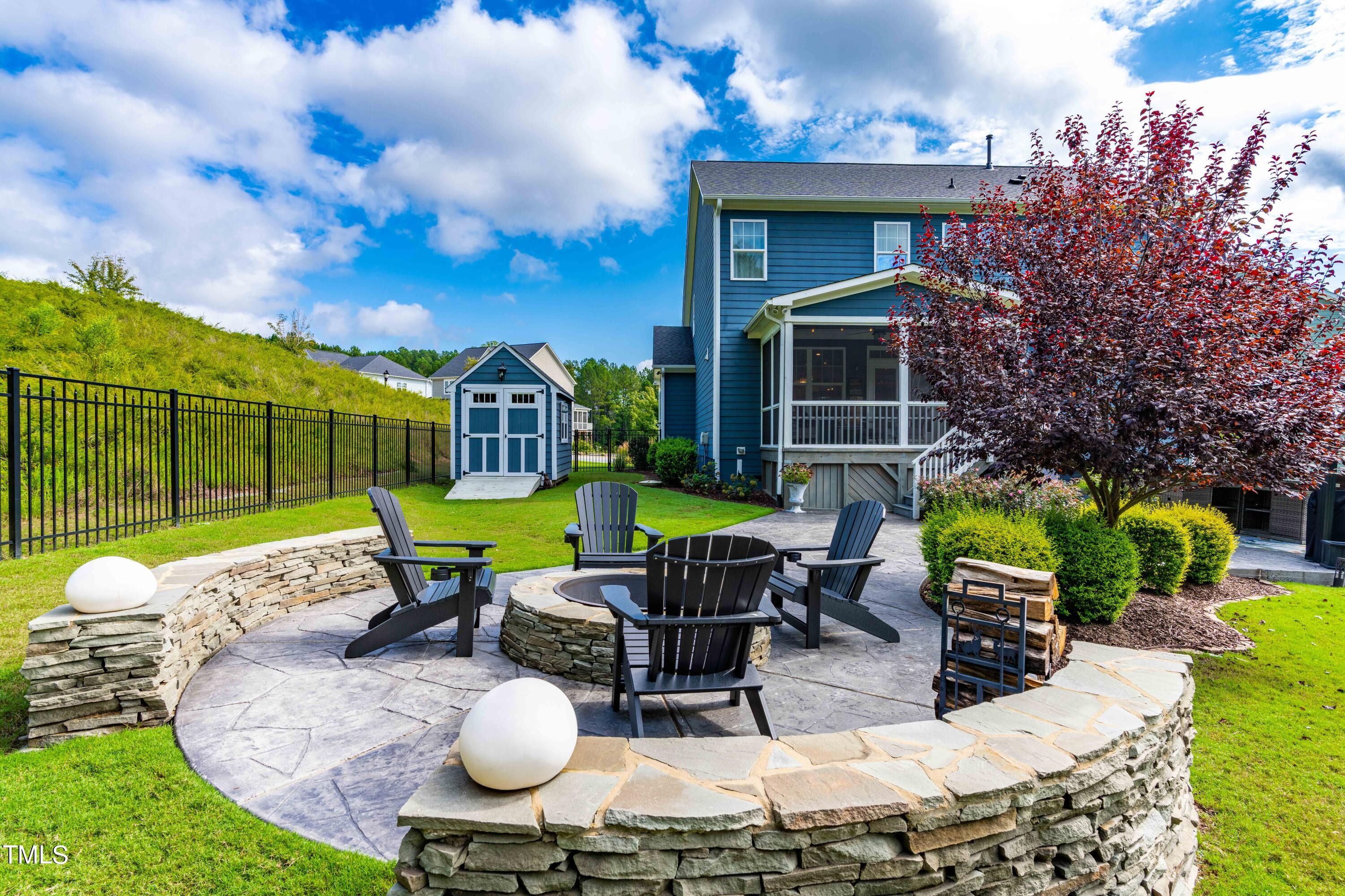 190 Hidden Bluff Drive Pittsboro, NC 27312 - Photo 53 of 58 a view of an chairs and table in backyard