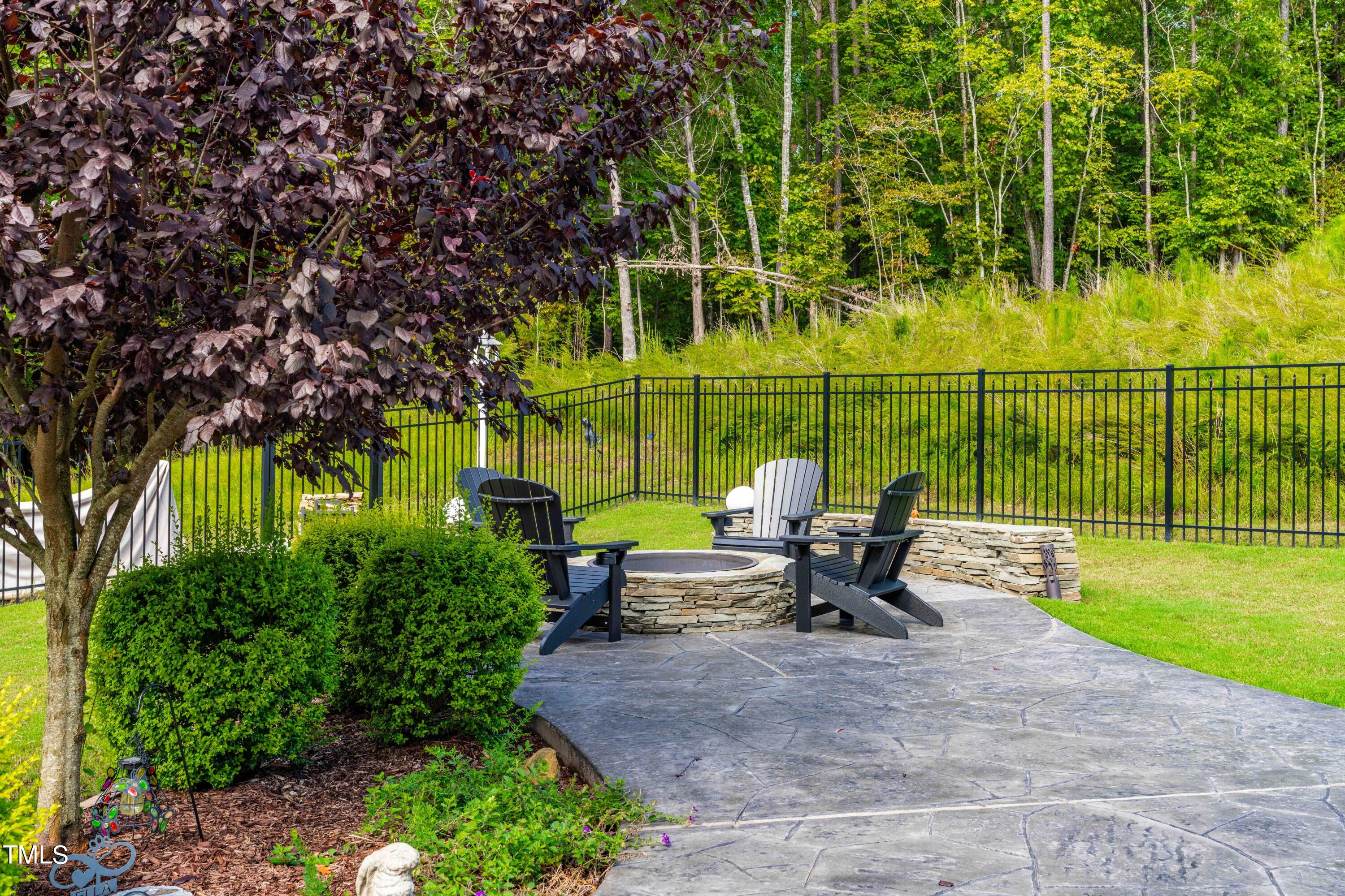 190 Hidden Bluff Drive Pittsboro, NC 27312 - Photo 58 of 58 a park bench sitting in the middle of a park