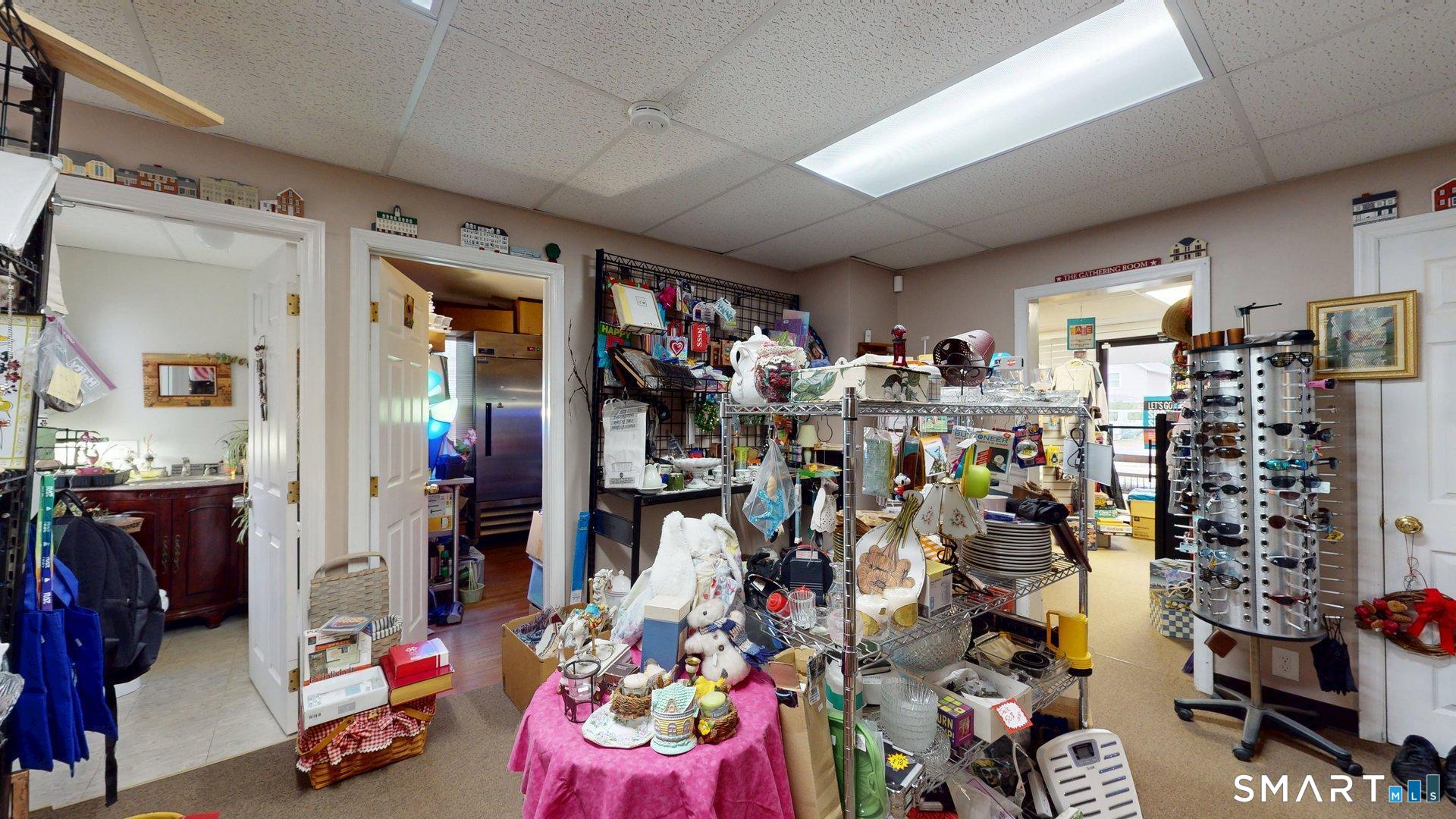 138 Main Street Somers, CT 06071 - Photo 12 of 44 a view of a room with lots of stuff and toys