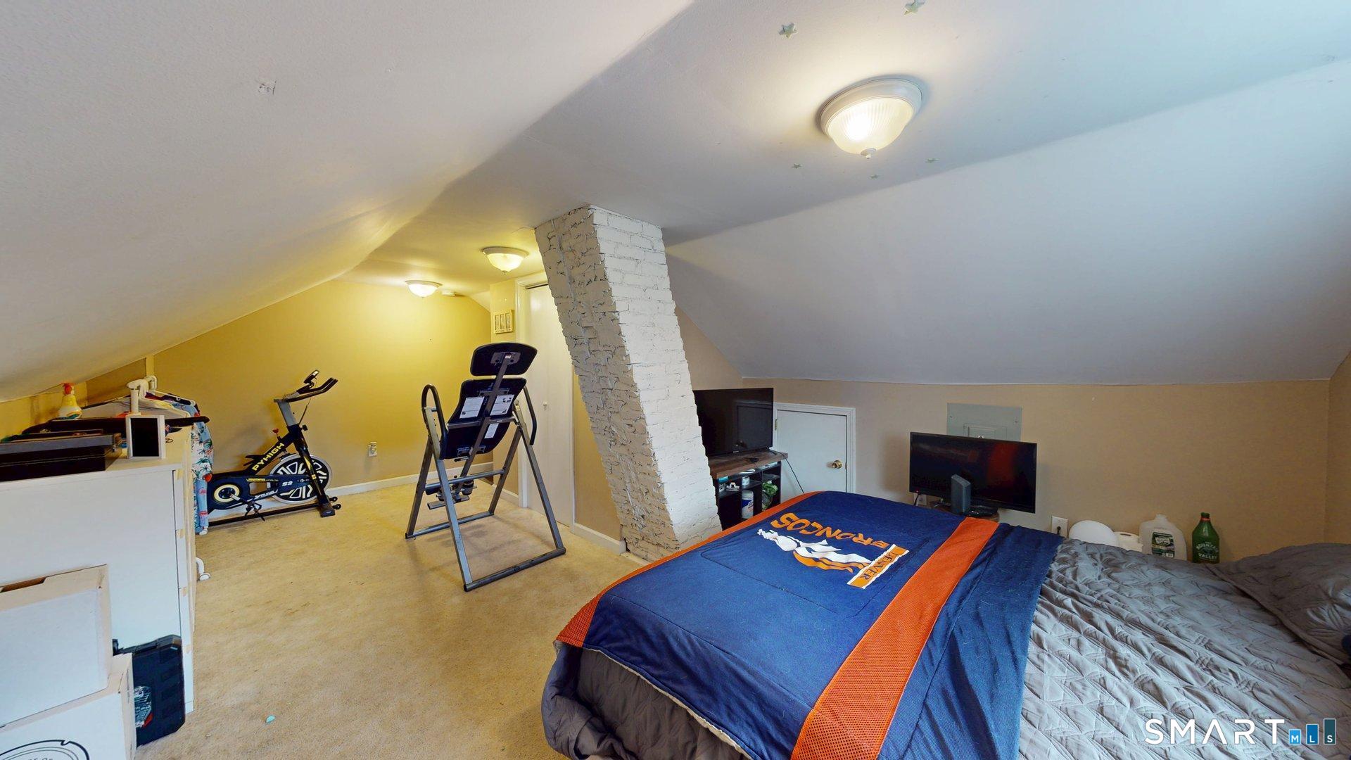 138 Main Street Somers, CT 06071 - Photo 23 of 44 a bedroom with bed and a wooden floor