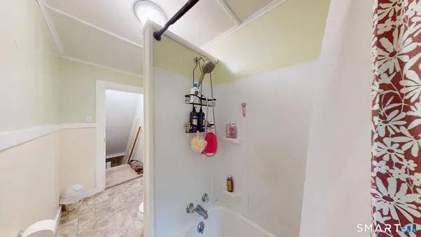 a kitchen with a refrigerator and a microwave