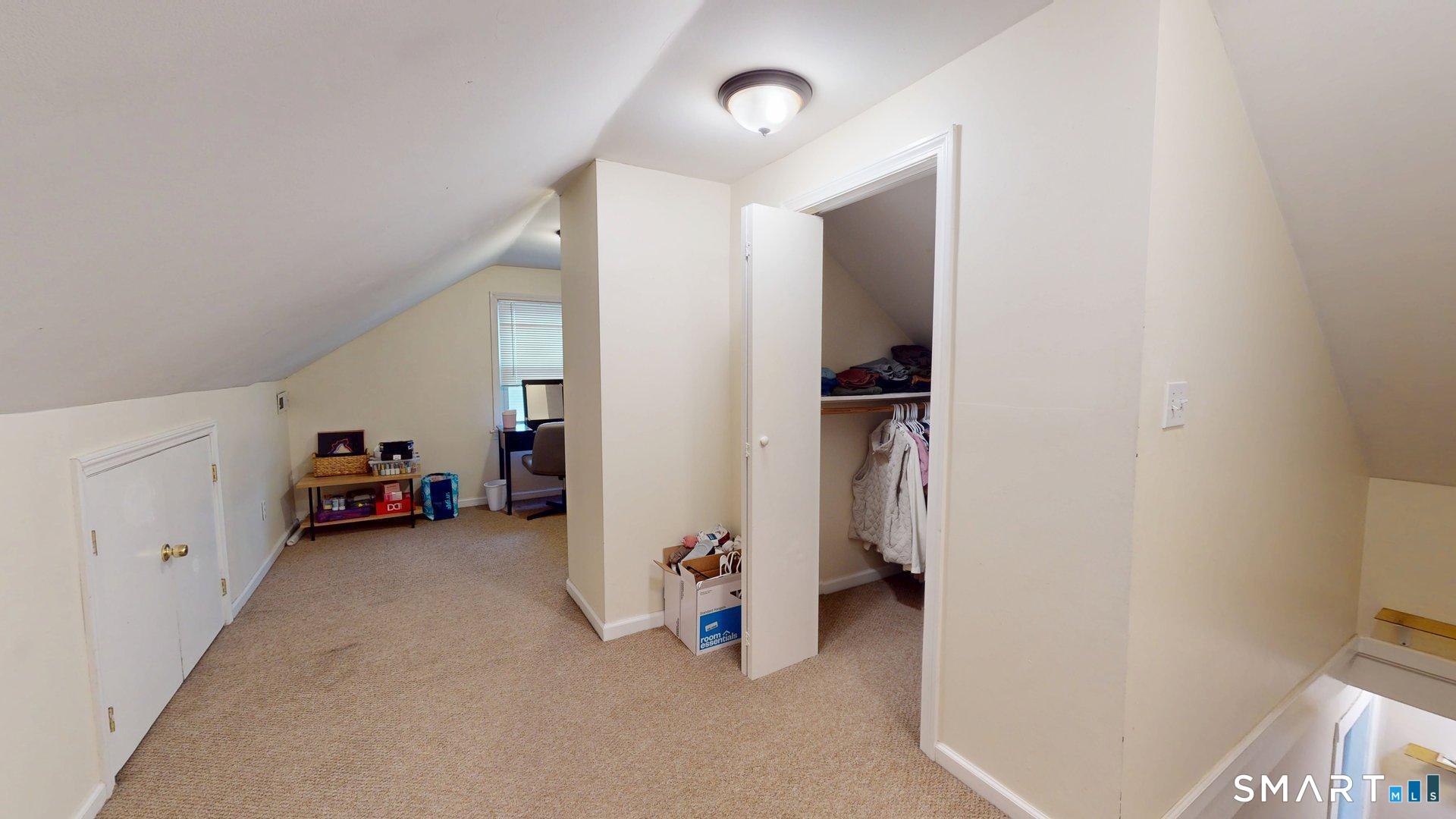 138 Main Street Somers, CT 06071 - Photo 35 of 44 a view of a livingroom with the kitchen and a window