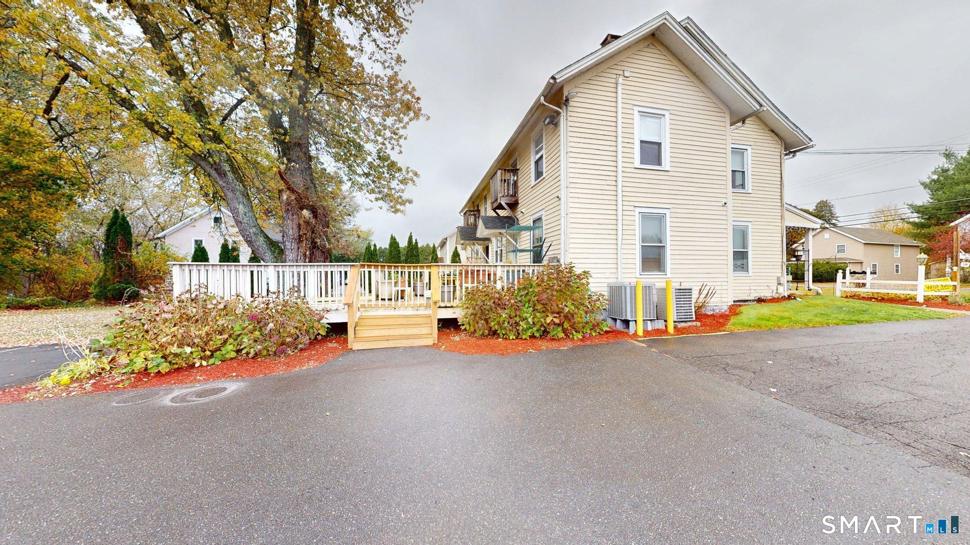 138 Main Street Somers, CT 06071 - Photo 39 of 44 a view of a house with a yard and pathway