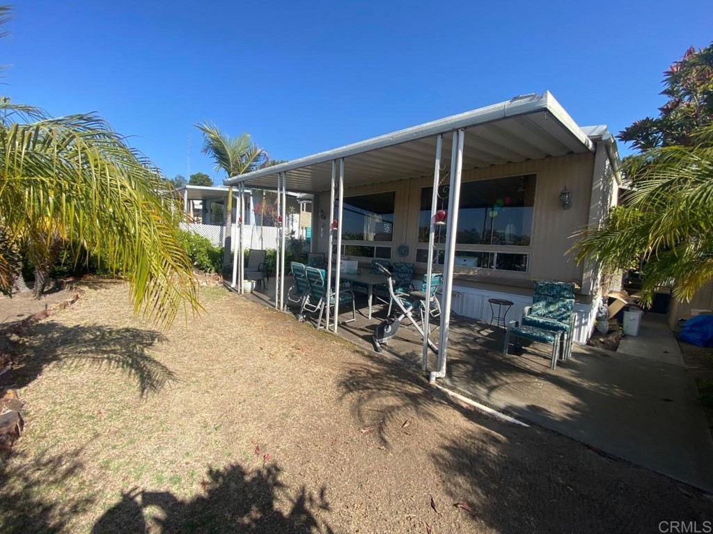 5036 Old Cliffs Road San Diego, CA 92120 - Photo 1 of 1 a view of a house with backyard