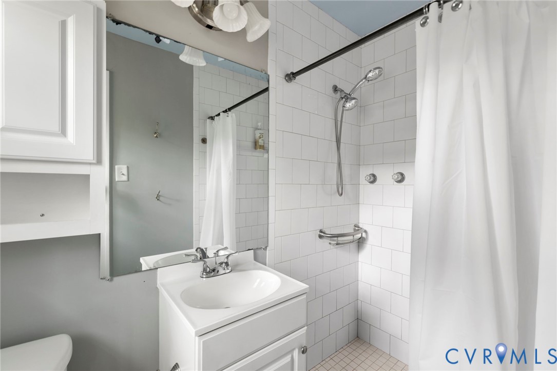 3311 Ottawa Road Richmond, VA 23225 - Photo 20 of 30 a bathroom with a sink toilet and shower