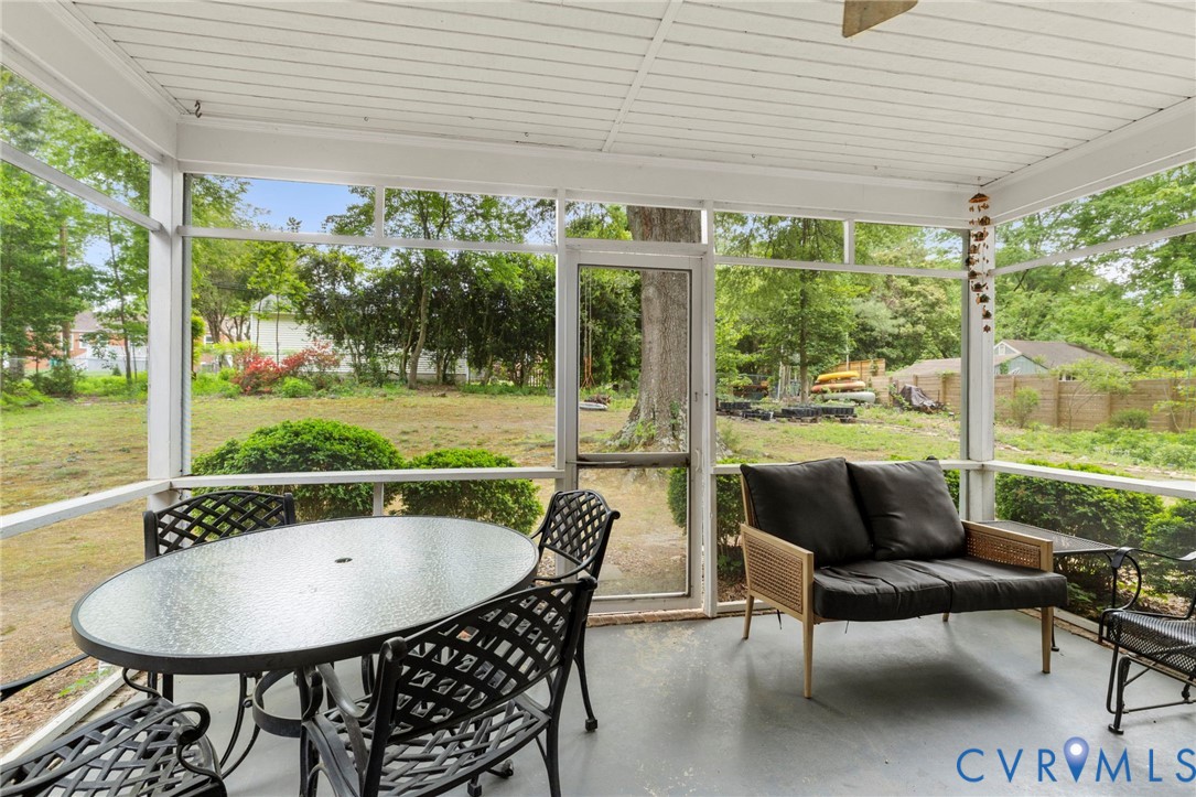 3311 Ottawa Road Richmond, VA 23225 - Photo 22 of 30 a view of a patio with a table chairs and a backyard