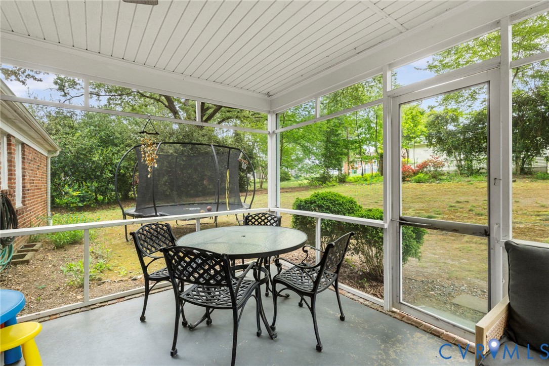 3311 Ottawa Road Richmond, VA 23225 - Photo 23 of 30 a view of a patio with a table chairs and a backyard